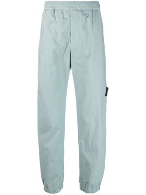 Stone Island pantalon de jogging à patch Compass - Bleu