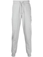 Tommy Hilfiger logo-print tapered track pants - Gris - thumbnail