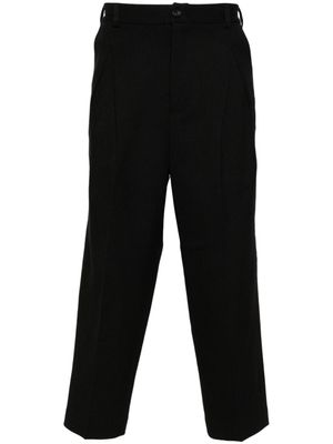 White Mountaineering pantalon fuselé à boutonnière - Noir