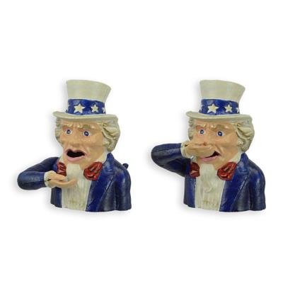 A CAST IRON UNCLE SAM MECHANICAL BANK