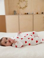 Baby pyjama met hartjes in fleece PETIT BATEAU wit hartjesprint