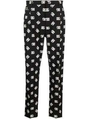 Dolce & Gabbana pantalon fuselé à motif monogrammé - Noir