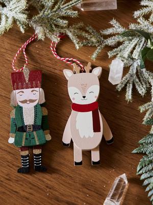 Set van 2 houten poppetjes Notenkraker groen