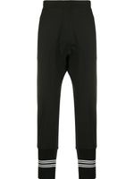 Neil Barrett pantalon de jogging à coupe sarouel - Noir