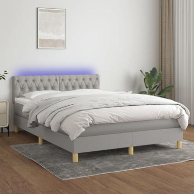 Boxspring met matras en LED stof lichtgrijs 140x190 cm