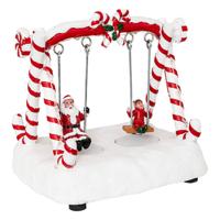 Kerstdorp schommel met kerstman - met verlichting en beweging - 16 cm - polyresin