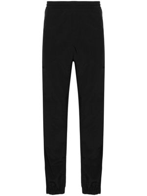 MSGM pantalon fuselé à logo brodé - Noir