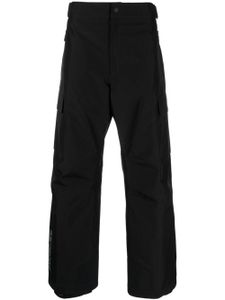 Moncler Grenoble pantalon droit à boutons pression - Noir