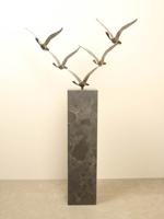 5 bronzen zwanen