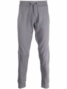 Calvin Klein Jeans pantalon de jogging à bande logo - Gris