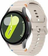 Wave Sportband met aansluitknop - Sterrenlicht - Samsung Galaxy Watch 6 Classic - 47mm & 43mm Wave Sportband met aansluitknop - Sterrenlicht - Samsung Galaxy Watch 6 Classic - 47mm & 43mm