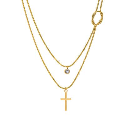 Geknoopte dubbele ketting met kruisje en zirkoon