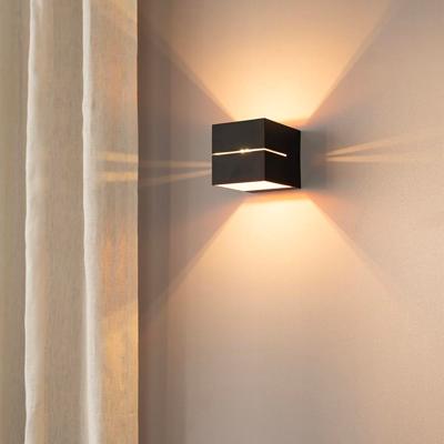 Gemini nero oro by LUSENZ - Kubusvormige up and down wandlamp met mat zwarte coating en gouden interieur