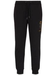 Armani Exchange pantalon de jogging à motif dragon brodé - Noir