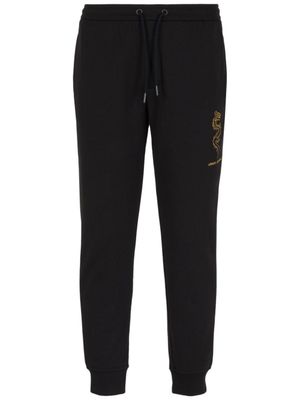 Armani Exchange pantalon de jogging à motif dragon brodé - Noir