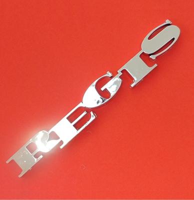 Rock-Ola Regis afdekkap embleem