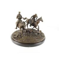 A BRONZE SCULPTURE OF TWO COSSACKS ON HORSEBACK A BRONZE SCULPTURE OF TWO COSSACKS ON HORSEBACK
