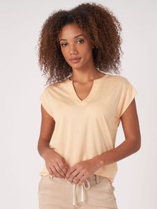 Mouwloze top met ronde hals met split