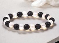 Parel en lavasteen armband - Spiritualiteit - Spiritueelboek.nl