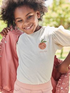 Meisjes t-shirt met bolletjesmouw en fruitmotief op de borst ecru