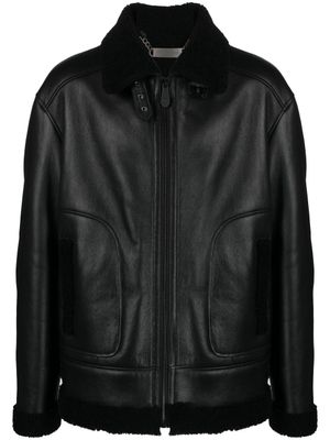 Philipp Plein portefeuille en cuir à imprimé tête de mort - Noir