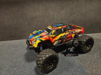 Tweedehands Traxxas X-Maxx 8S - Solar Flame