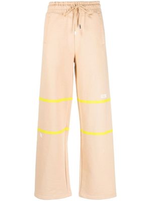 GCDS pantalon de jogging à détails rayés - Marron