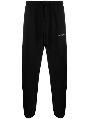 Ih Nom Uh Nit pantalon de jogging en coton à logo imprimé - Noir