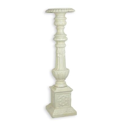 A CAST IRON CANDLE STAND - WHITE