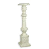 A CAST IRON CANDLE STAND - WHITE
