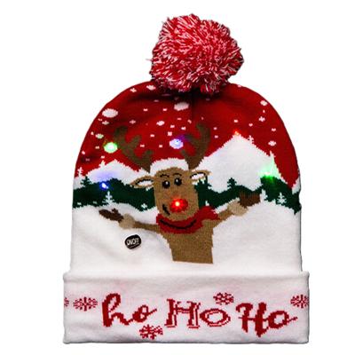 Foute winter muts- rood - Ho Ho Ho - met LED lampjes - volwassenen - verlichte kerstmuts