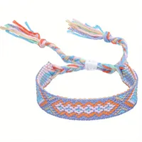 Handgemaakte geweven verstelbare armband uit Nepal met wit-lichtblauw-oranje motief - Sieraden - Spiritueelboek.nl - thumbnail