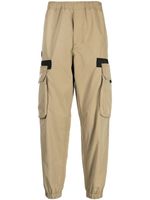 AAPE BY *A BATHING APE® pantalon de jogging à logo imprimé - Marron