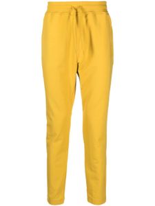 C.P. Company pantalon de jogging à logo imprimé - Jaune