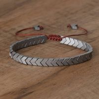 Verstelbare Hematiet Armband met Zilveren Gloed in Pijlvorm - Sieraden - Spiritueelboek.nl
