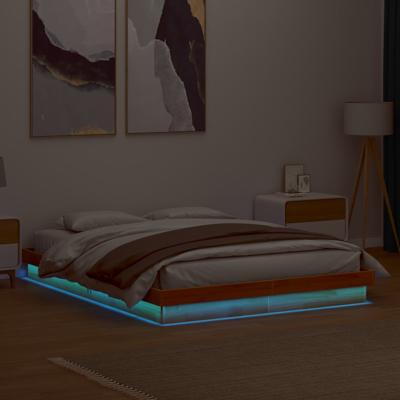 Bedframe met LED massief grenenhout wasbruin 150x200 cm