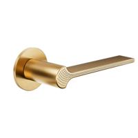 DND handles DND Ginkgo Biloba deurkruk op rond rozet - PVD warm goud DND handles DND Ginkgo Biloba deurkruk op rond rozet - PVD warm goud