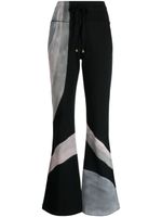 Madison.Maison x Designing Hollywood pantalon de jogging à motif Hand - Noir