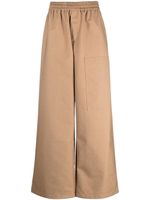 Off-White pantalon ample à logo embossé - Marron