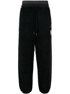 Maison MIHARA YASUHIRO pantalon de jogging en coton à design superposé - Noir