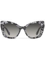 Dolce & Gabbana Eyewear lunettes de soleil à monture papillon - Noir