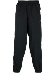 Nike pantalon de jogging à logo Solo Swoosh - Noir