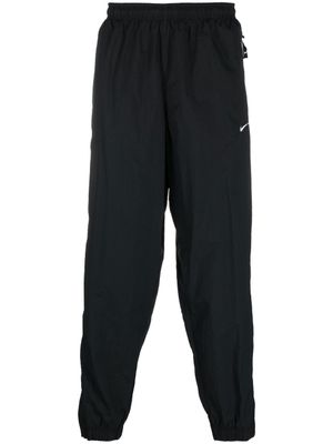 Nike pantalon de jogging à logo Solo Swoosh - Noir