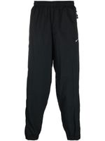 Nike pantalon de jogging à logo Solo Swoosh - Noir Nike pantalon de jogging à logo Solo Swoosh - Noir