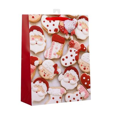 Kerst cadeau tasje - 32 cm - Kerstman en kerstvrouw - inpakken - kerstcadeaus Kerst cadeau tasje - 32 cm - Kerstman en kerstvrouw - inpakken - kerstcadeaus