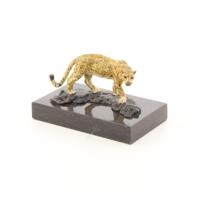 A BRONZE SCULPTURE OF A JAGUAR