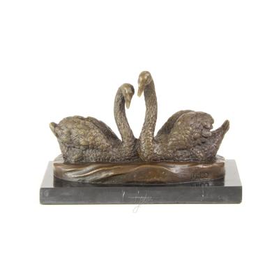 A BRONZE SCULPTURE OF A PAIR OF SWANS