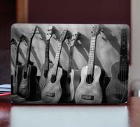 Stickers voor laptop Acht gitaren op een witte achtergrond - thumbnail