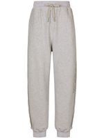 Dolce & Gabbana pantalon de jogging en coton à logo imprimé - Gris