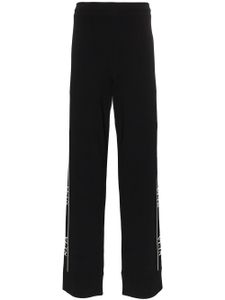 Valentino Garavani pantalon de jogging à bande logo - Noir